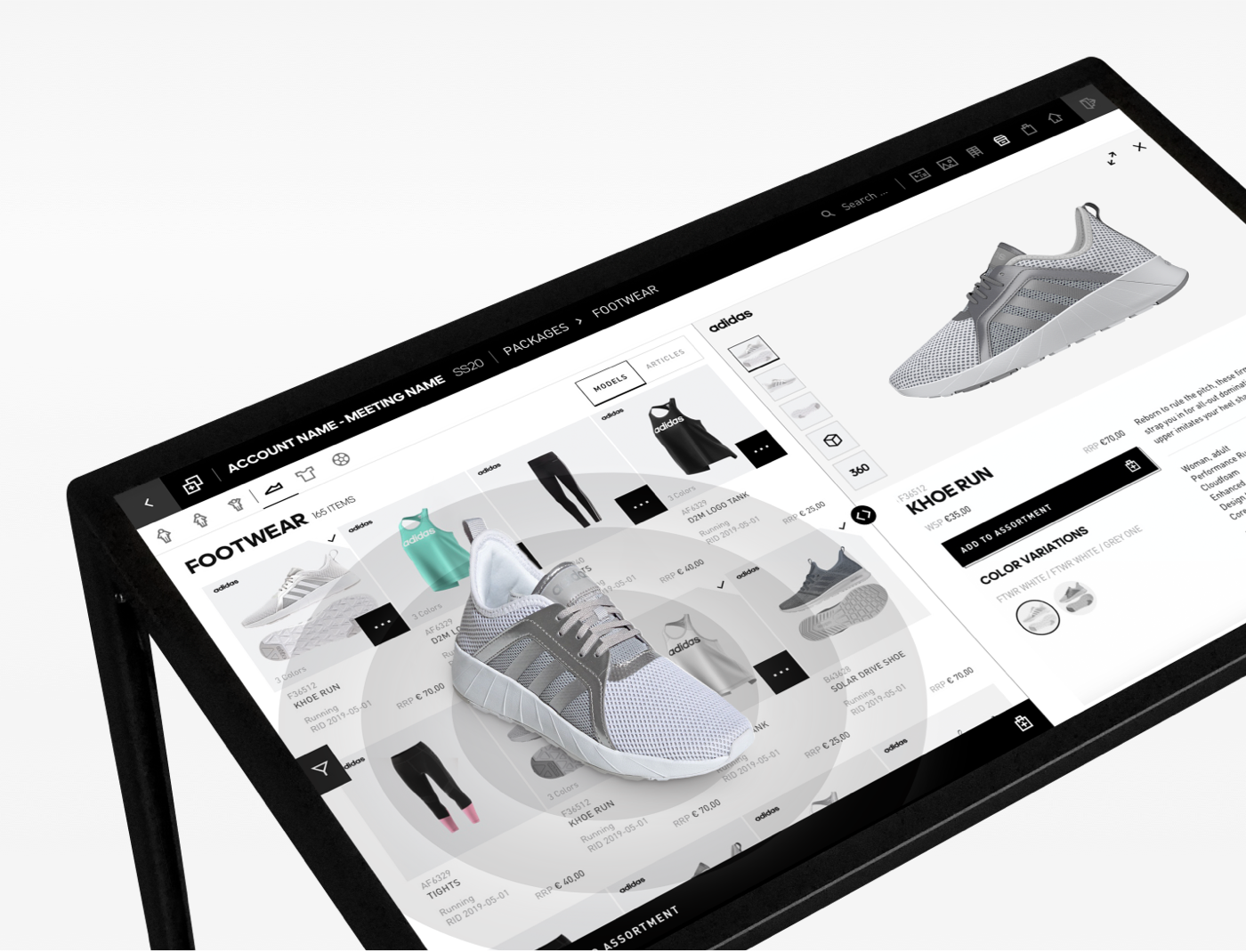 Digitales Terminal auf dem ein Schuh steht, auf der Bildschirmoberfläche das Produktdetail des Schuhs, übertragen durch RFID.