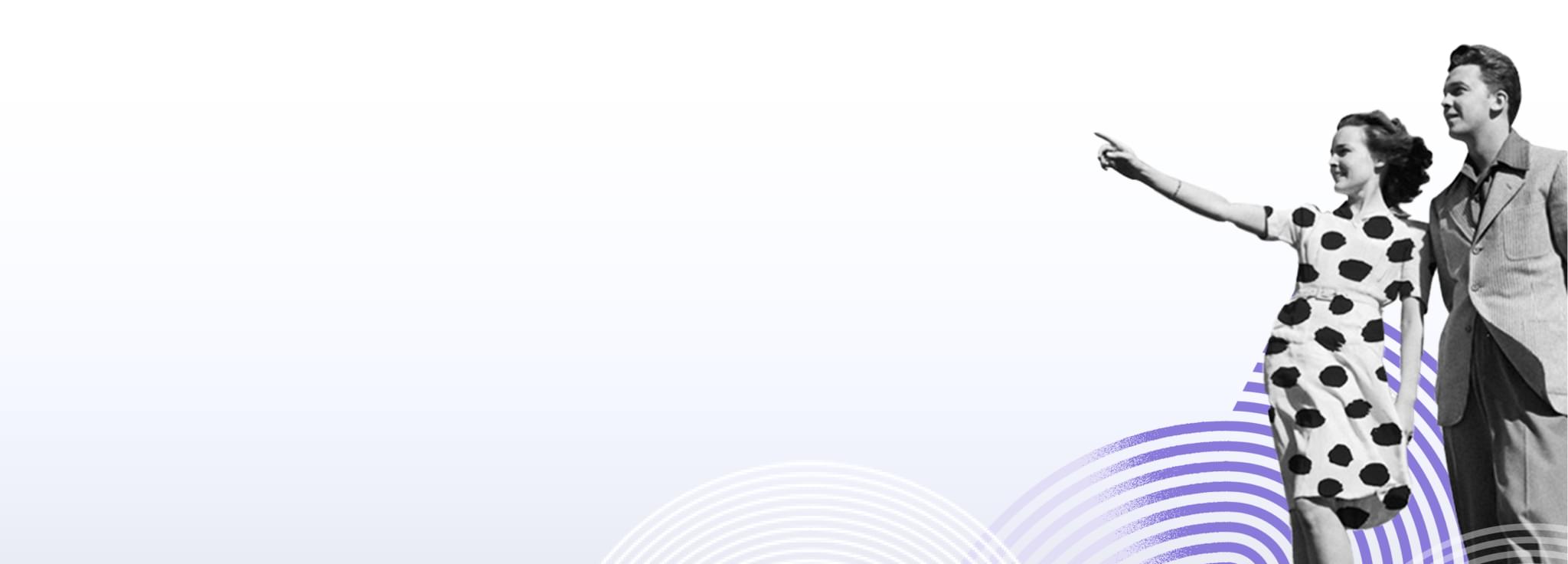 Ein Mann und eine Frau stehen zusammen, die Frau zeigt mit dem Finger in die Ferne.