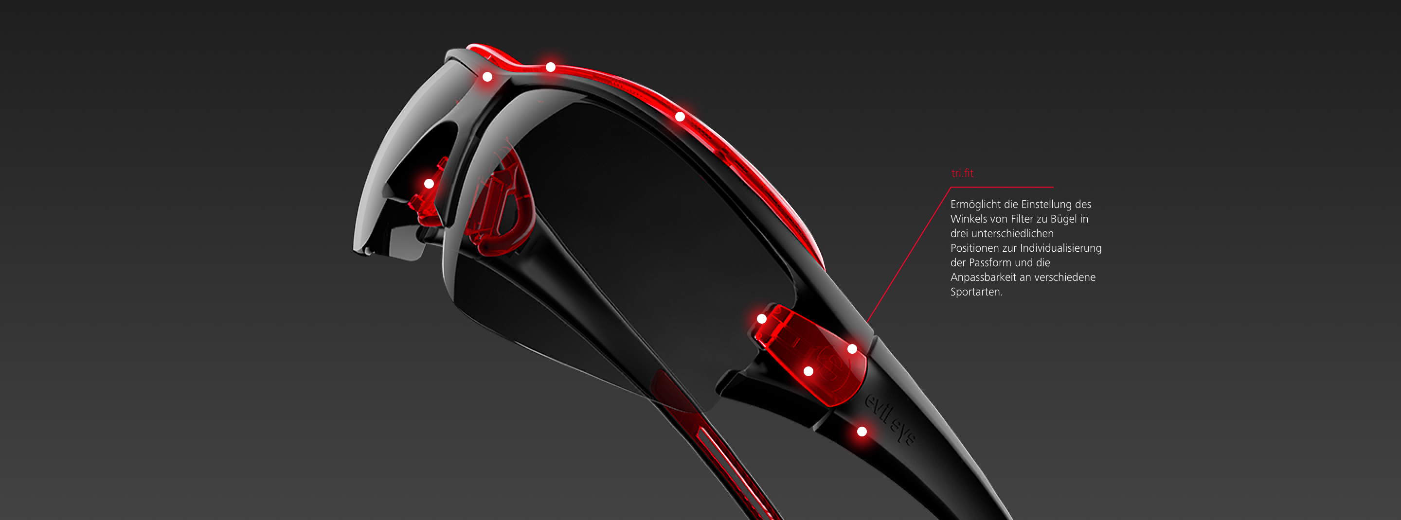 Schwarz-rote Sportbrille mit markierten tri fit-Einstellpunkten zur individuellen Anpassung, auf dunklem Hintergrund.