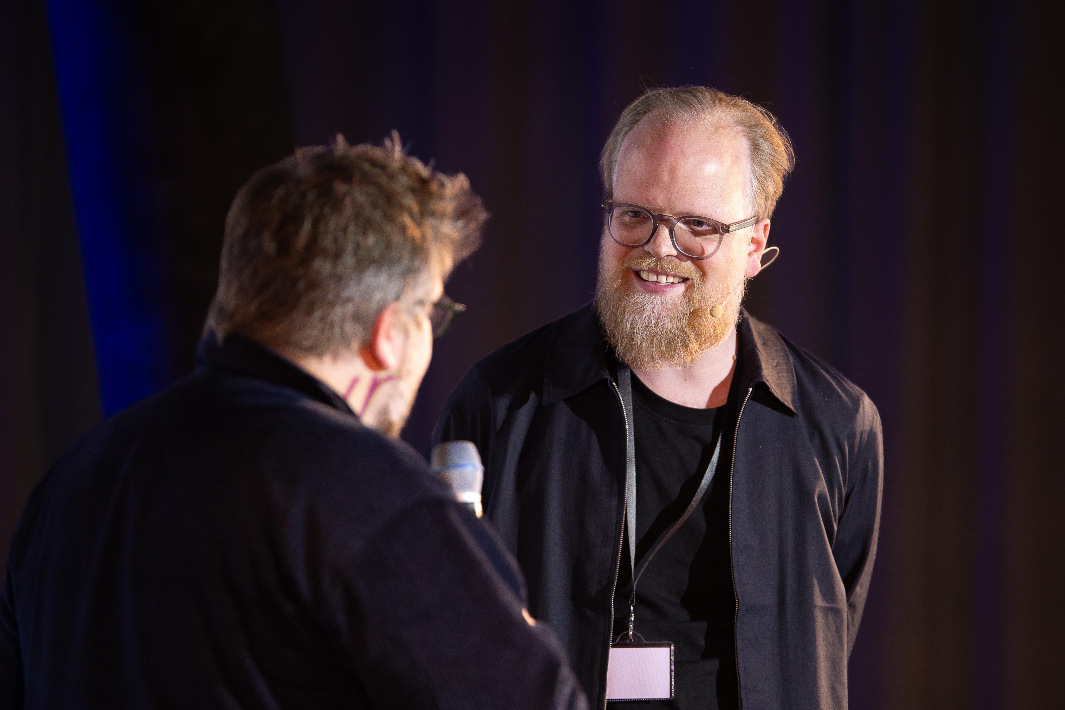 Martin with moderator Robert Weber on stage
