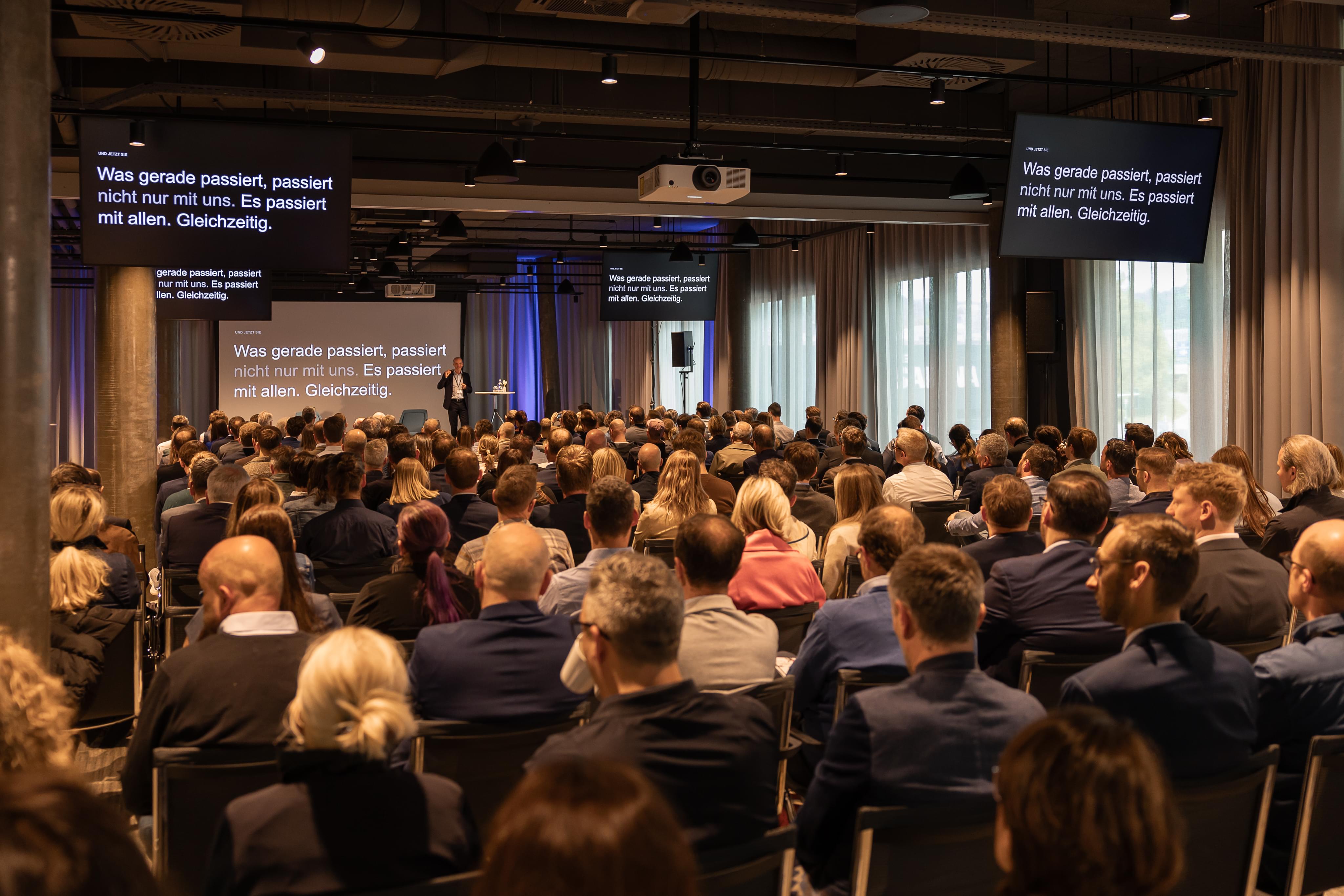 Albert Ortig presenting at the event